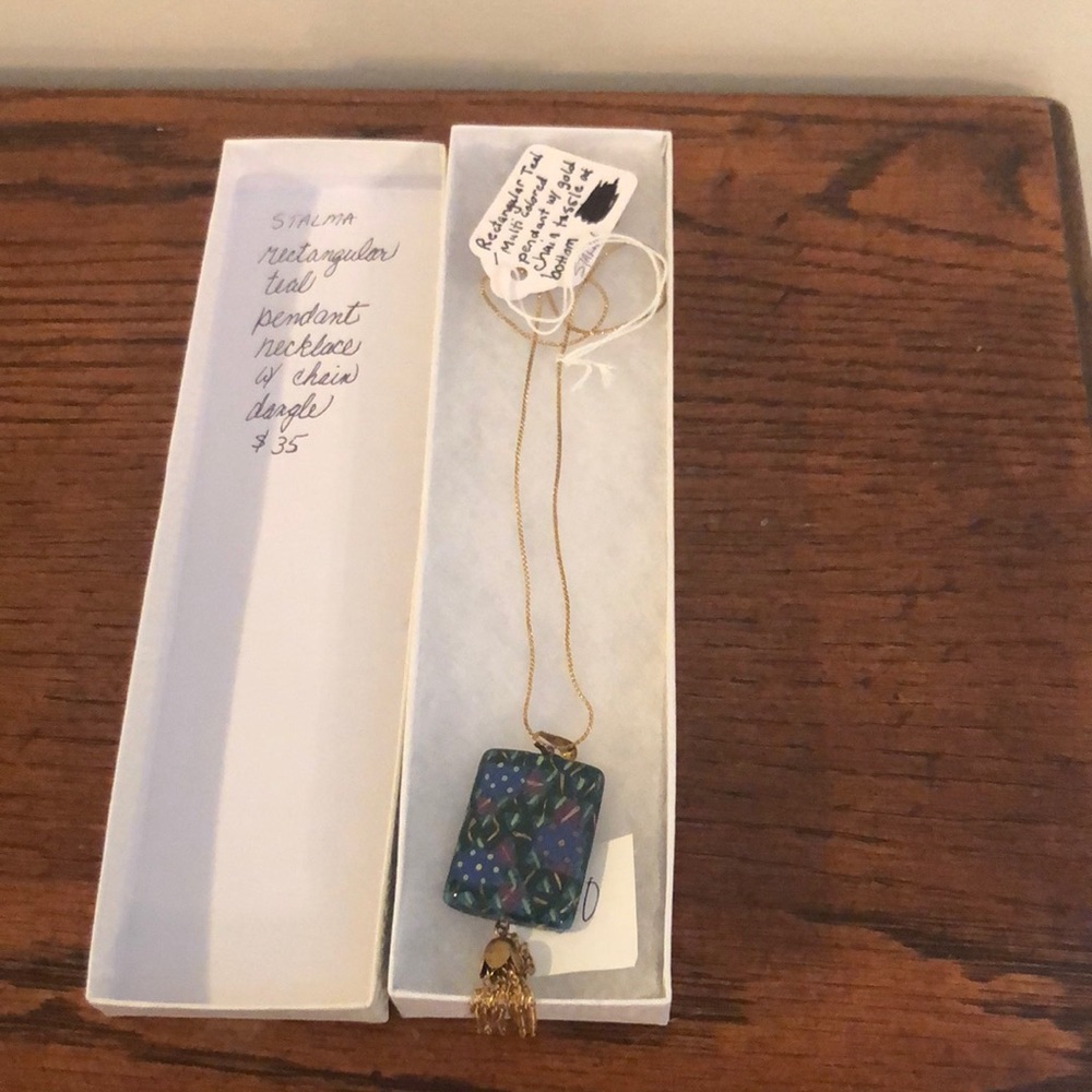 Pendant necklace. Tiel stone with tassel.